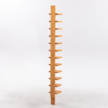 A 'Pilaster' shelf by John Kandell for Källemo, designed 1989.