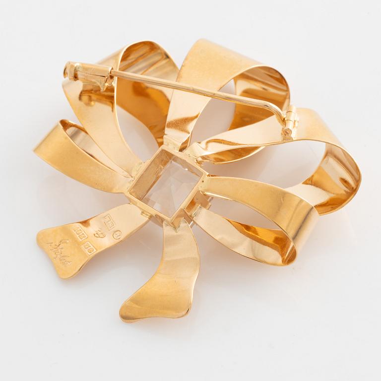 Stigbert, brosch 18K guld med bergkristall.