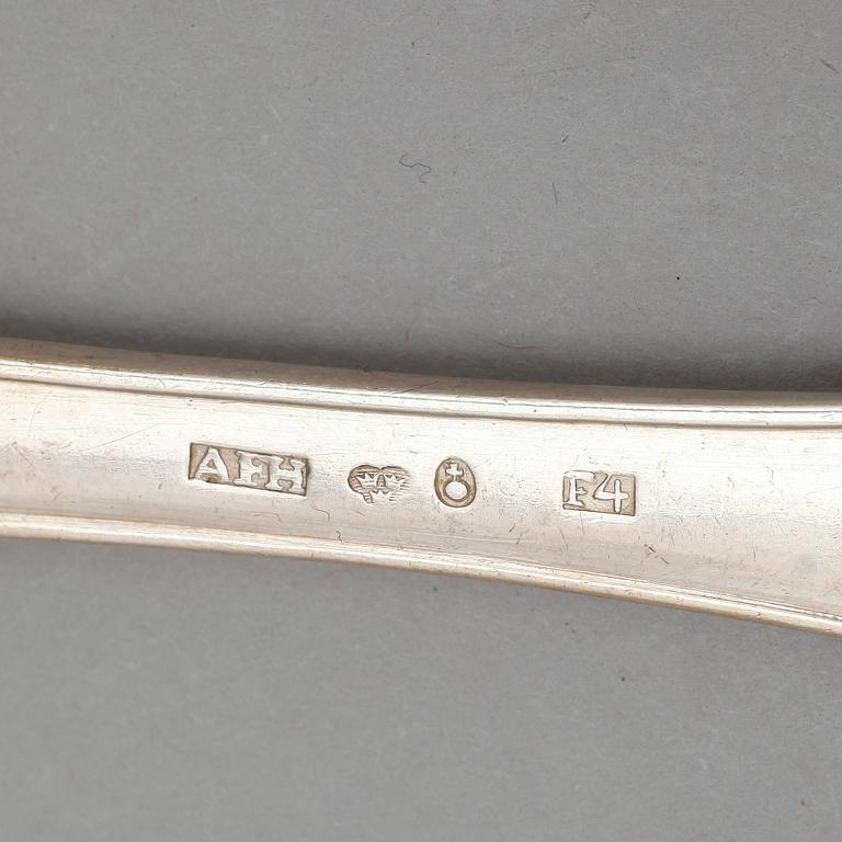 PARTI BESTICK, 18 st, silver, bland annat August Wilhelm Arnesen, Stockholm, 1869. Vikt ca 570g.