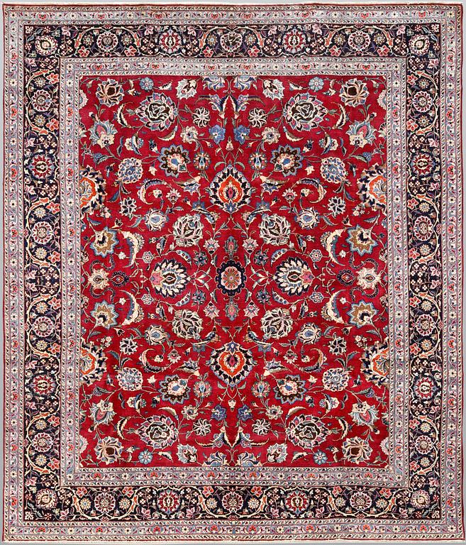 A Meshed carpet, approx. 340 x 295 cm.