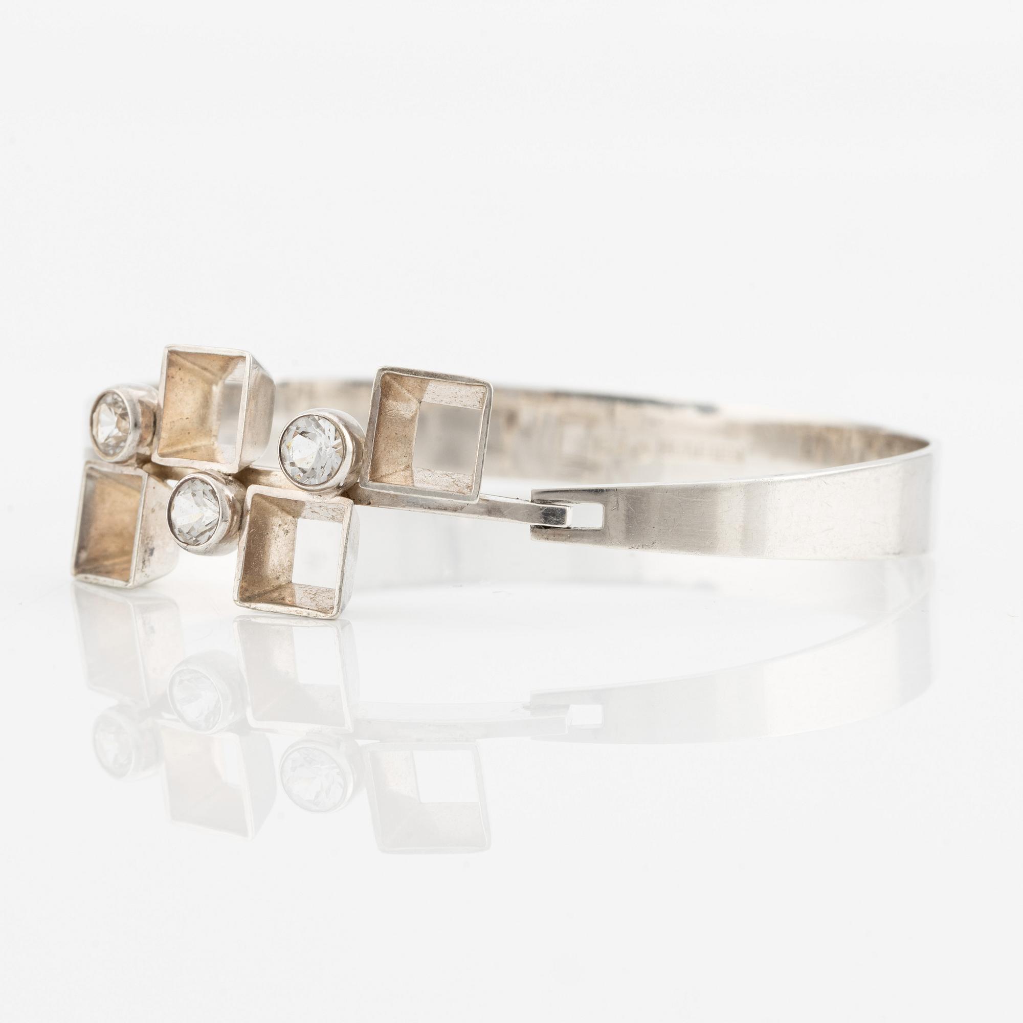 Bangle, Kultasepät Salovaara, silver with white synthetic stones. Turku/Åbo 1968.