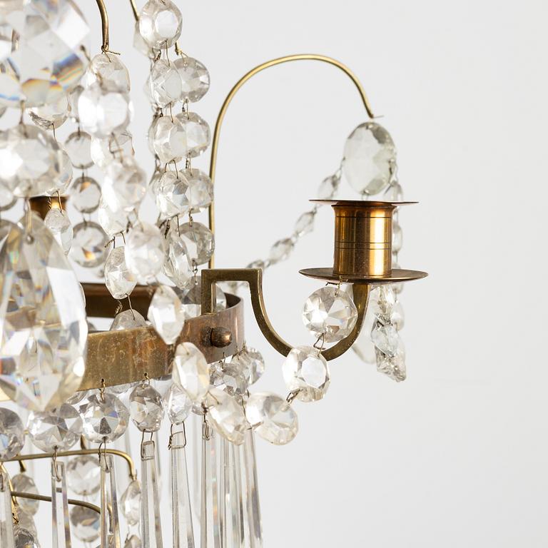 A four-light Gustavian-style chandelier, circa 1900.