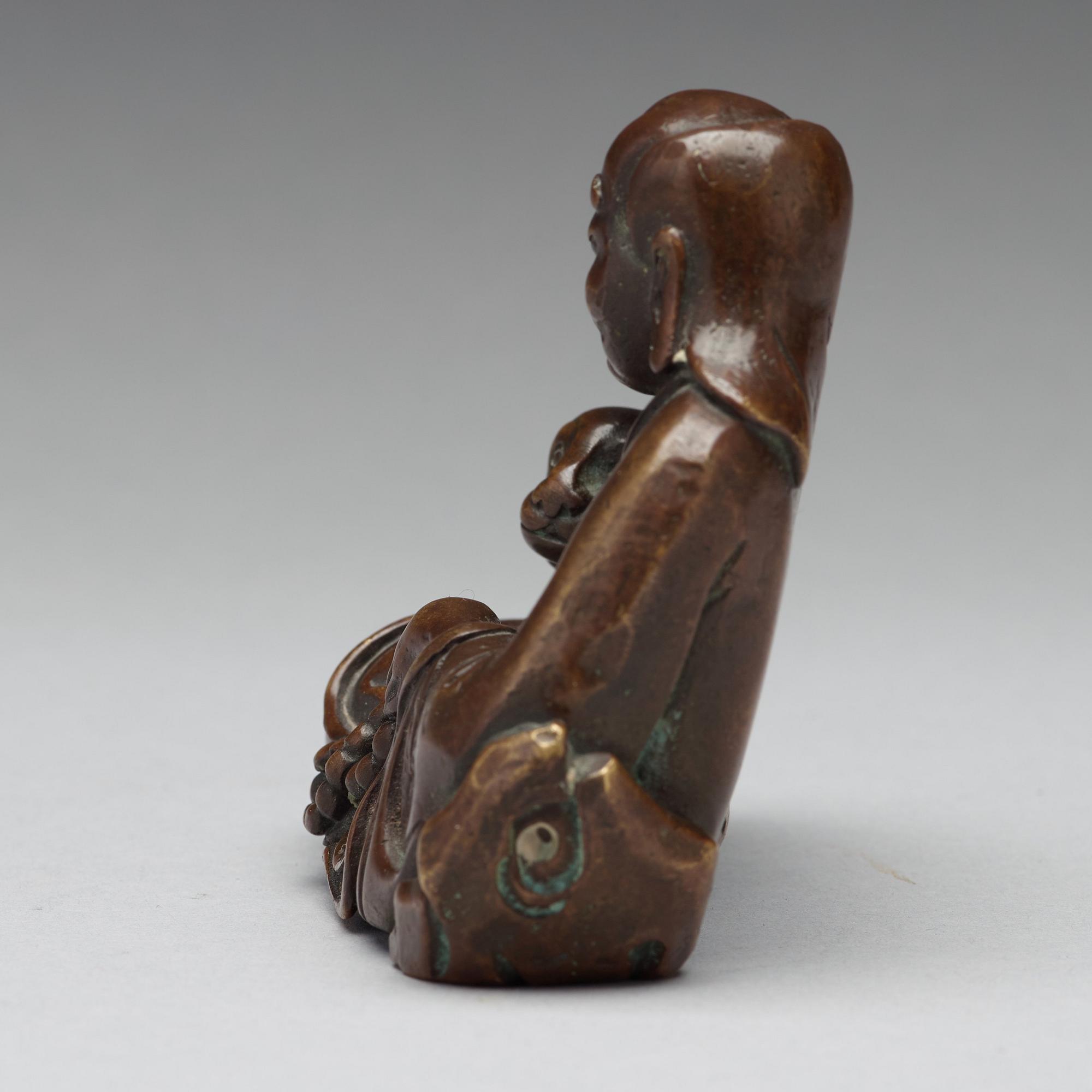 A bronze sculpture of one of the immortals, Qing dynasty, 18/19th Century.