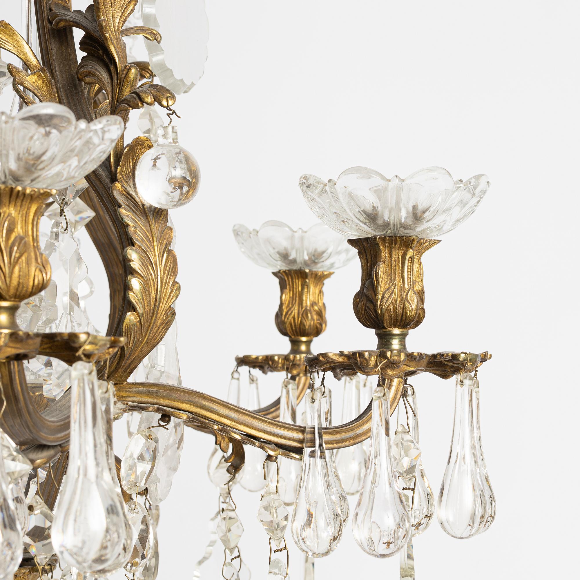 A six-branch rococ-style chandelier, first part 20th century.