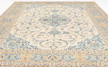 A signed Kashan, carpet ca 450 x 335 cm.