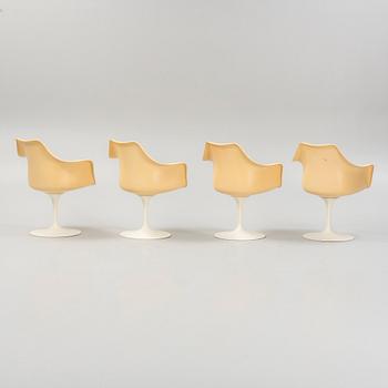 Eero Saarinen, four "Tulip" chairs, Knoll International, and a table.