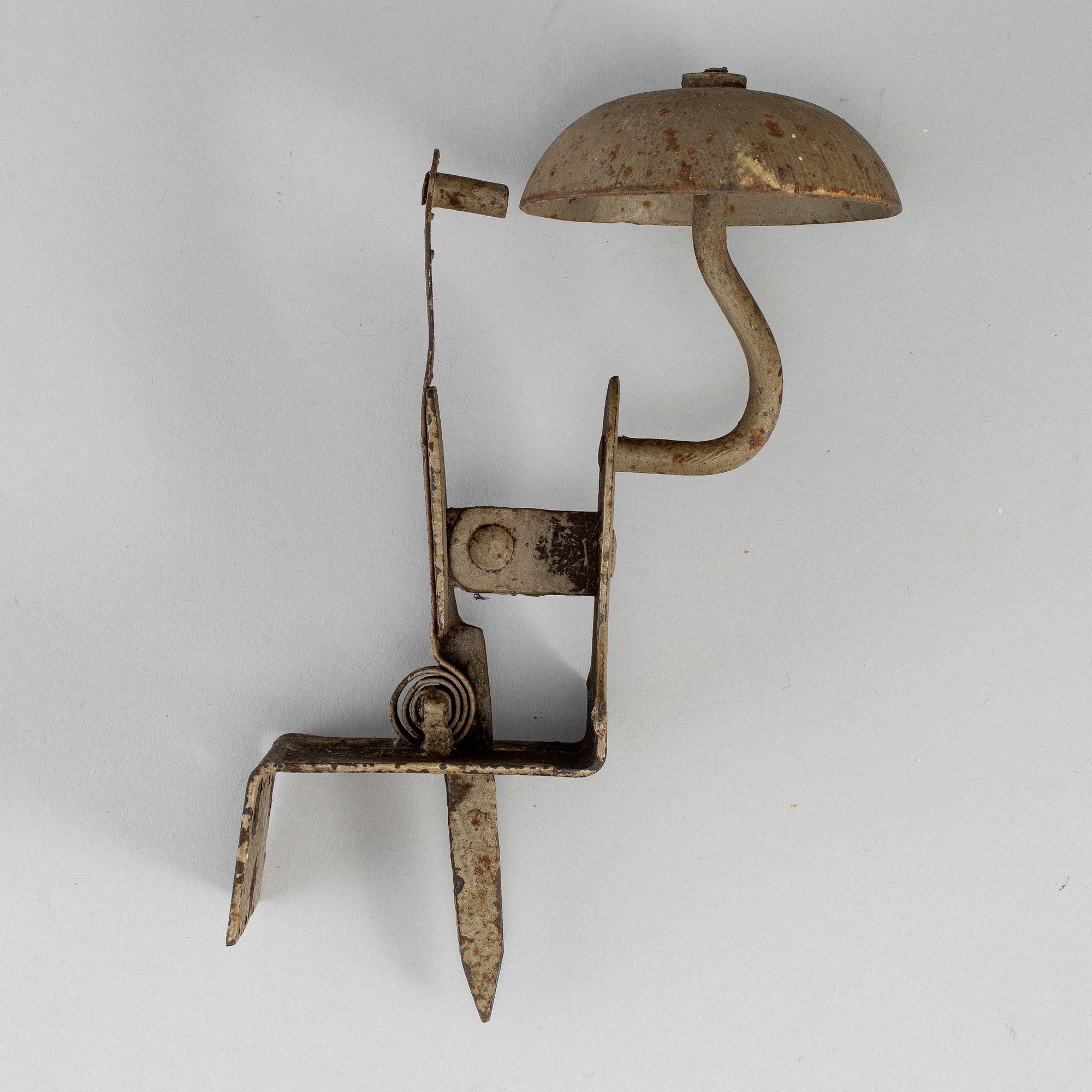 A 19th century iron door bell.