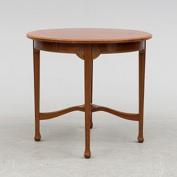 An early 20th century art nouveau table.
