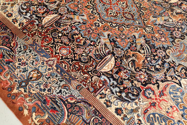 A figural Kashmar carpet, c. 352 x 247 cm.