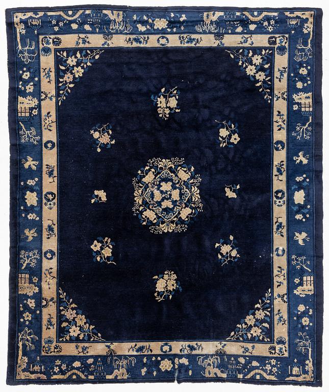 An antique Beijing carpet, northern China, approx. 287 x 239 cm.