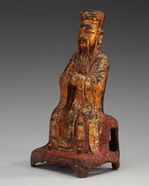 A lacquered and gilt bronze figure of a daoist dignitary, Ming dynasty (1368-1644).