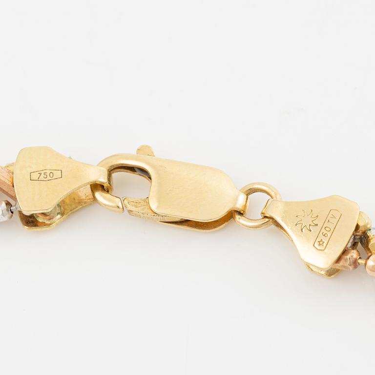Necklace and bracelet in 18K gold and white gold.