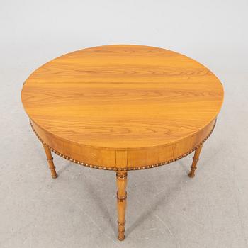 A kid 1800s late Empire birch game table.