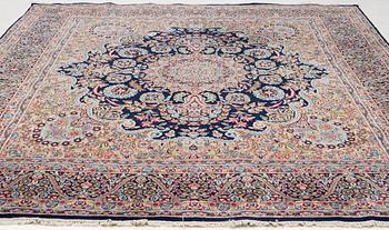 An oriental carpet, c. 385 x 300 cm.