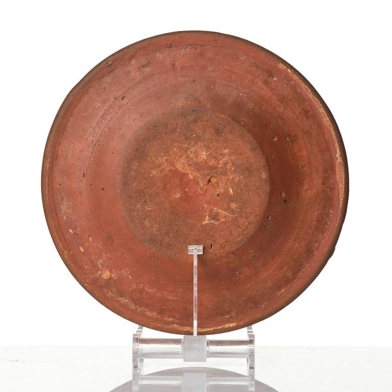 An earthenware dish, dated 1792.