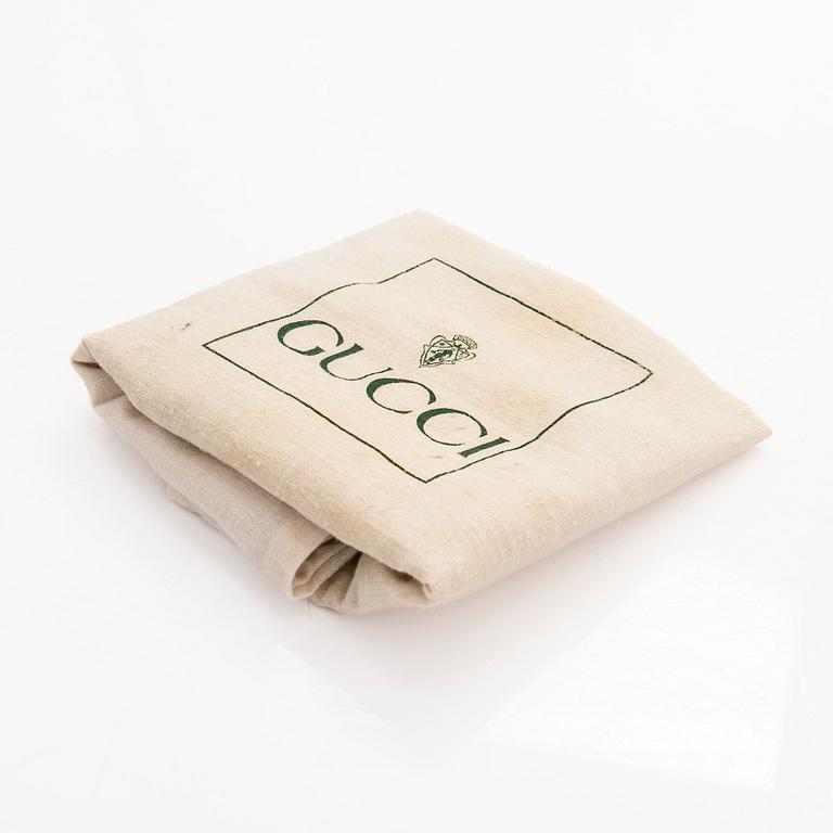 Gucci, a 'Bamboo' backpack.