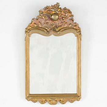 A rococo mirror, 18th century.