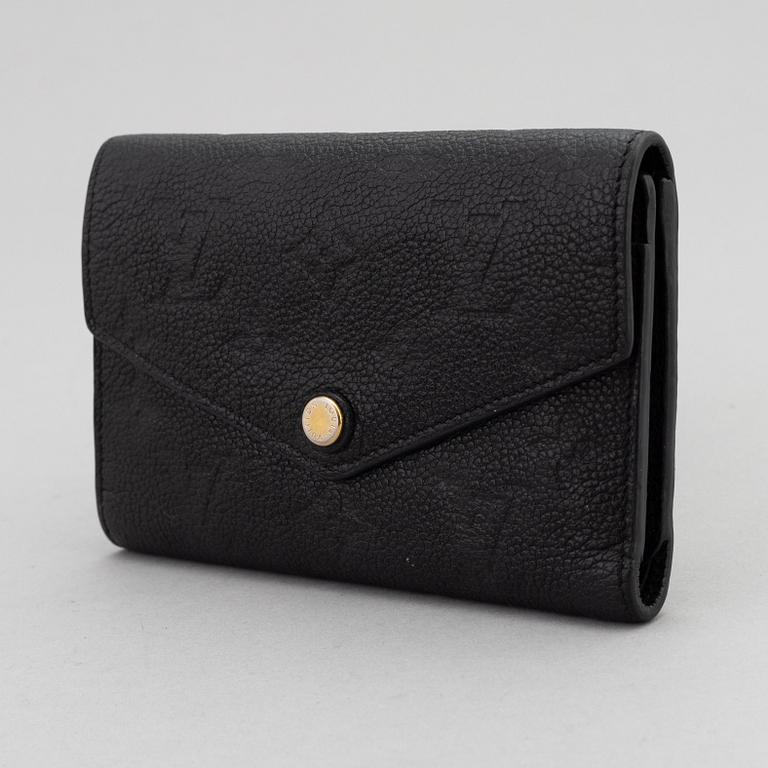 Louis Vuitton, a black Monogram Empreinte leather 'Curieuse' wallet, 2015.
