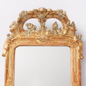 A Gustavian mirror by J Åkerblad (master in Stockholm 1758-1799), 1770s.