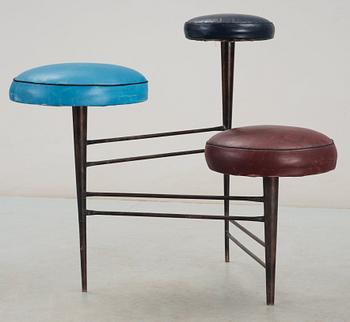 A 1950's black lacquered iron and leather stool, possibly Italy.