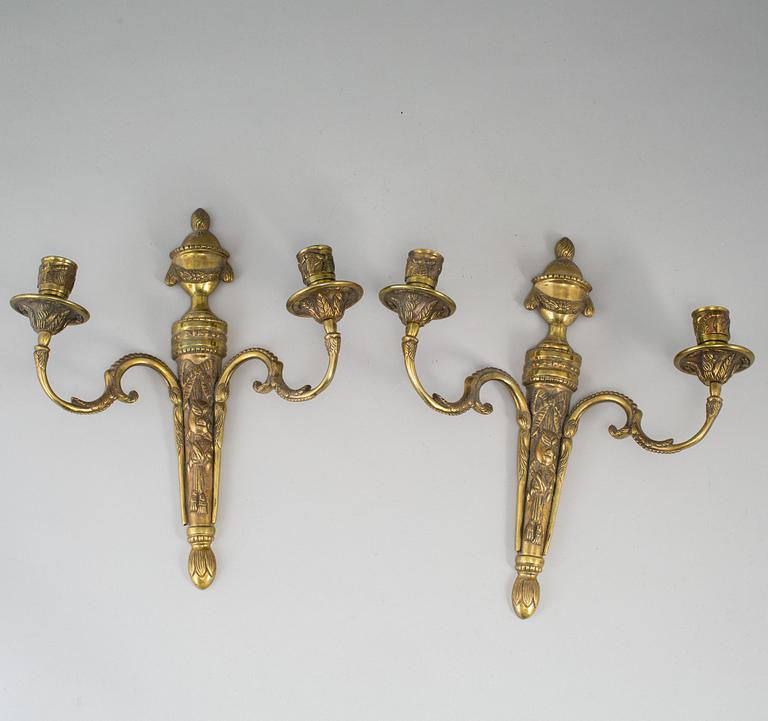 A pair of brass Louis XVI style wall sconces, 20th Century.