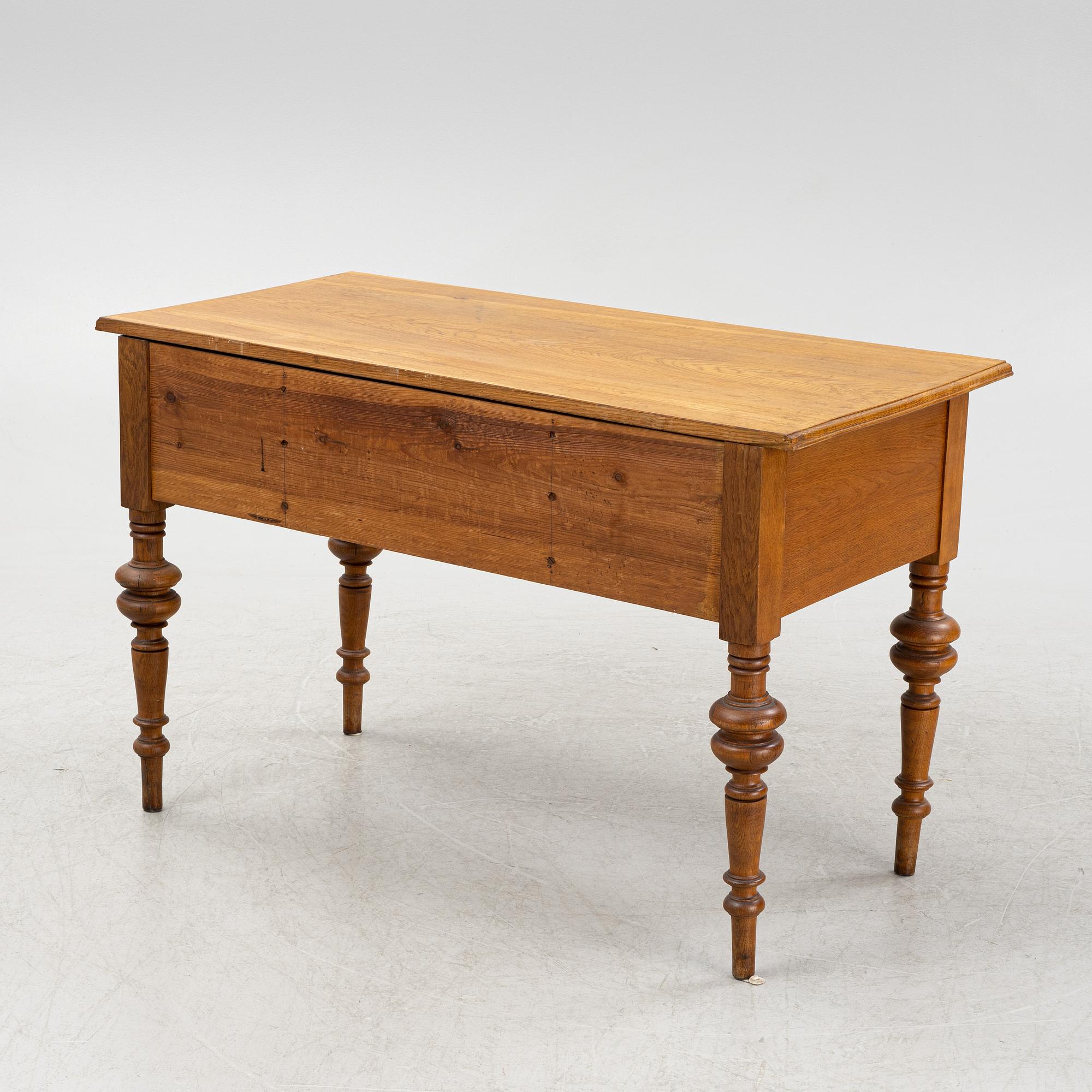 A renaissance style oak writing desk, end of the 19th Century.