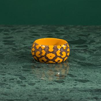 A bracelet "Leomonogram" by Louis Vuitton.