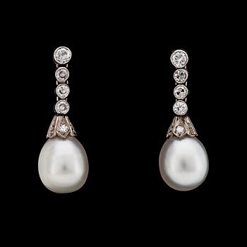 854. A pair of natural pearl, 8,3 mm,  and diamond earrings.
