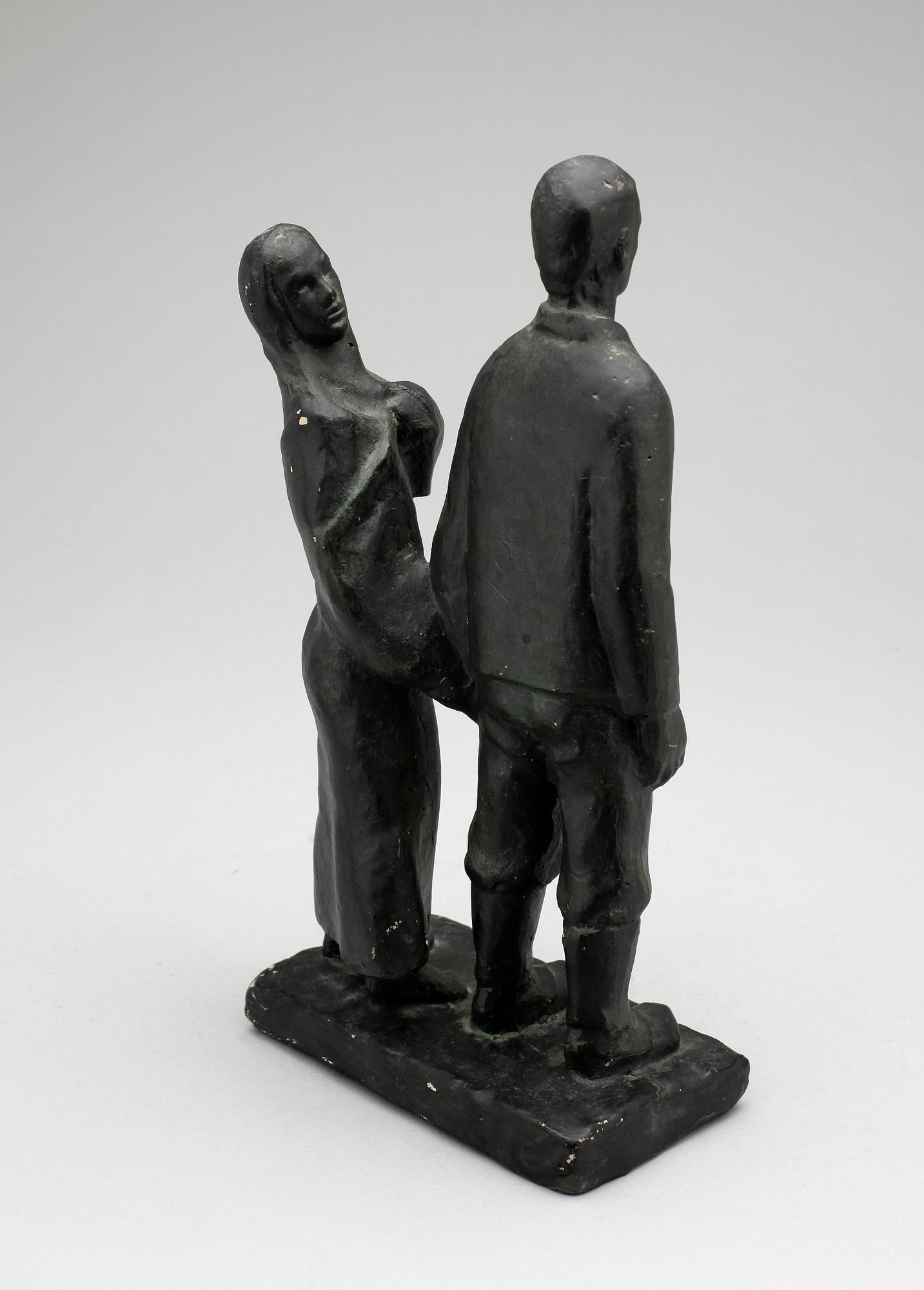 AXEL OLSSON, bemålad gips, bär signatur.