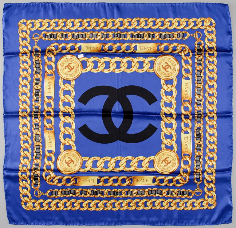 A silk scarf by Chanel.