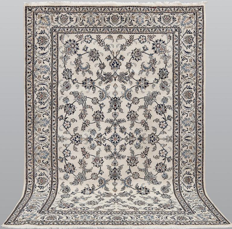 A part silk Nain carpet, ca 305 x 198 cm.