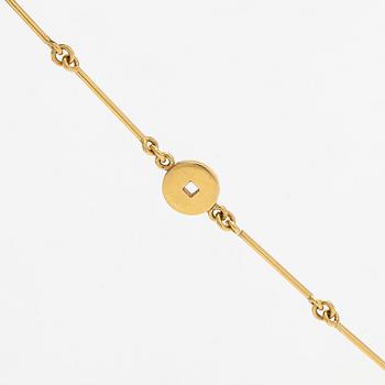 Pendant, faceted sapphires, rubies and diamonds, iron ore, 18K gold and white gold.