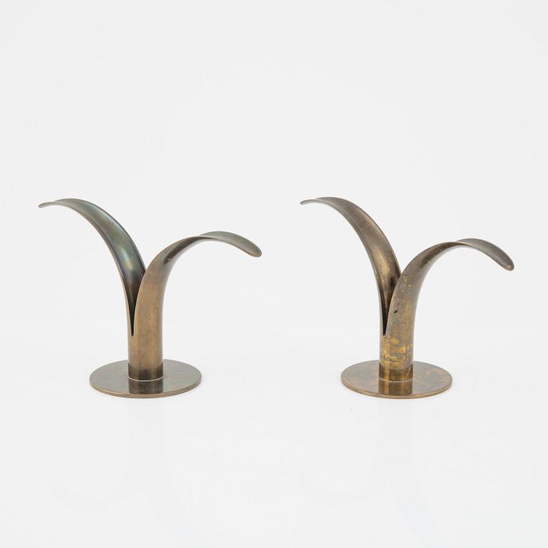 Ivar Ålenius-Björk, pair of bras candle holders, "Liljan", Ystad metall, mid 1900's.