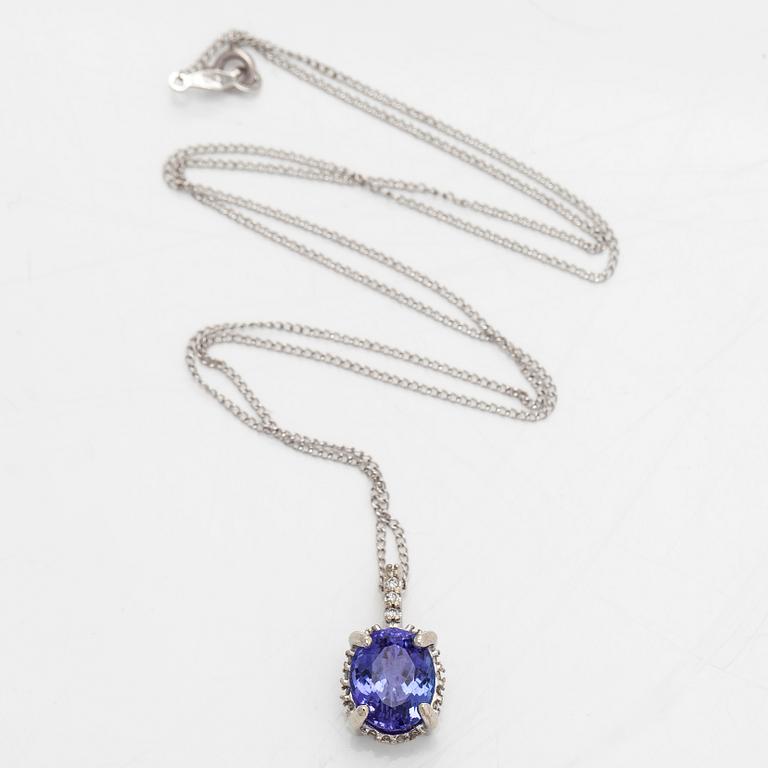 Kaulakoru, 14K valkokultaa, riipus tansaniitti ja timantteja.