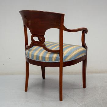 An early 20th century writing desk with chair.