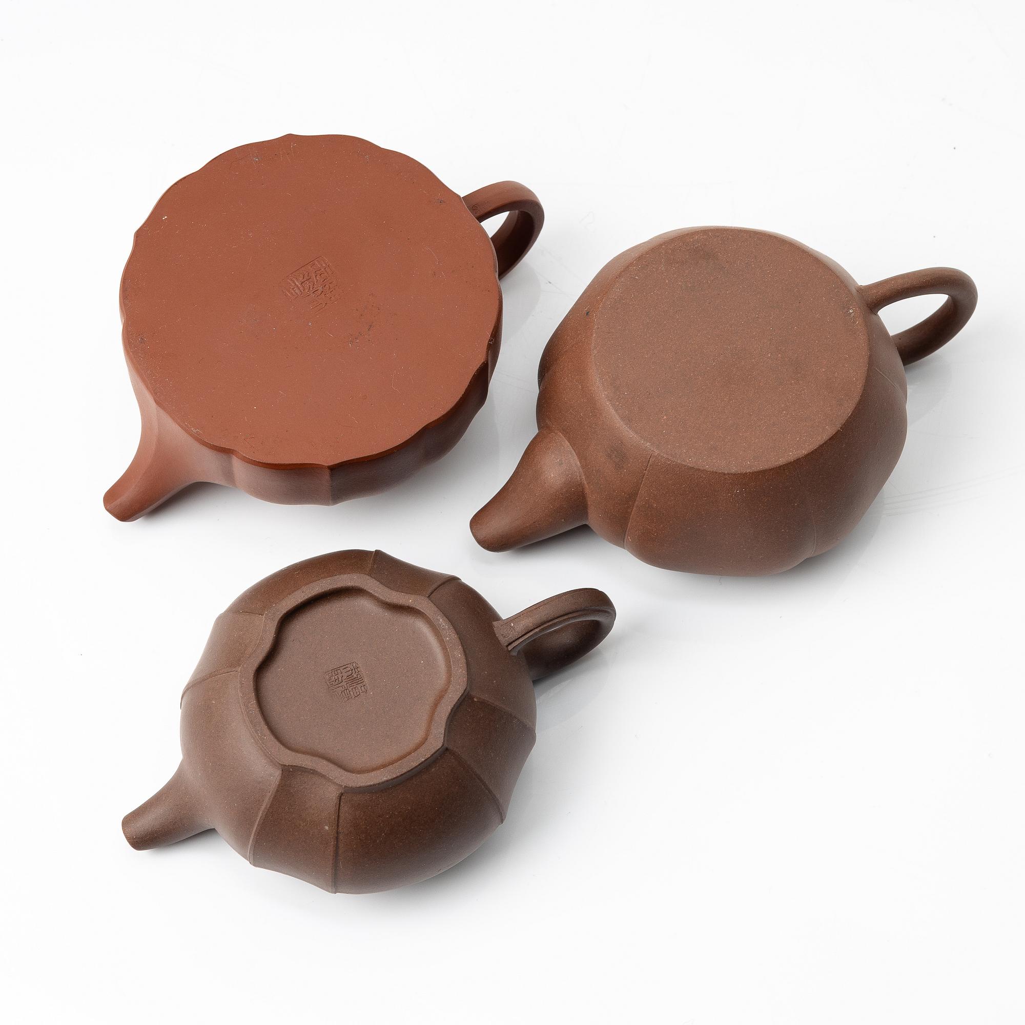 A group of three yixing teapots, China, 1980s.