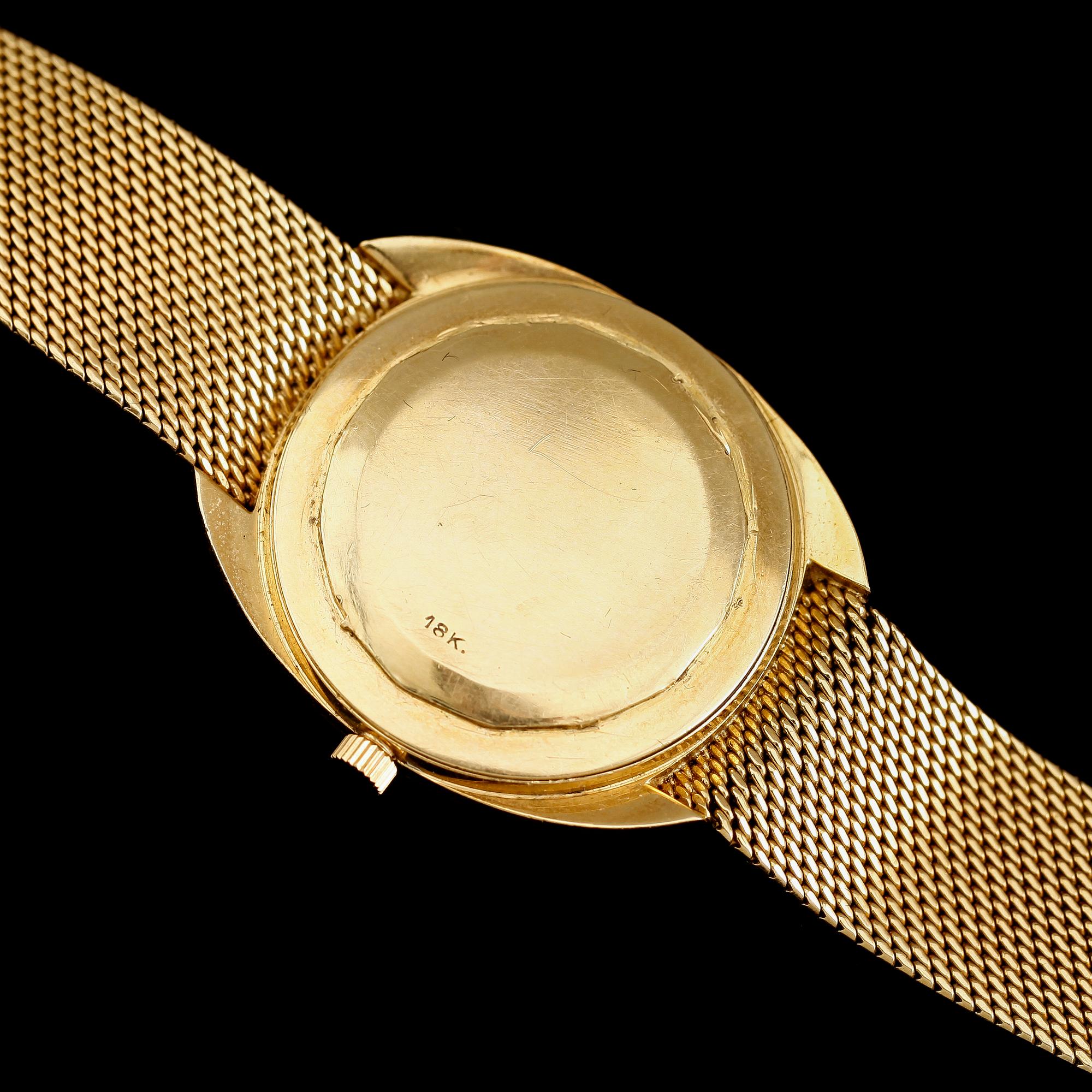 ARMBANDSUR, 18 k guld, Ebel Chronometer 36000, Fast Beat. Total vikt med armband och urverk 82 gram.