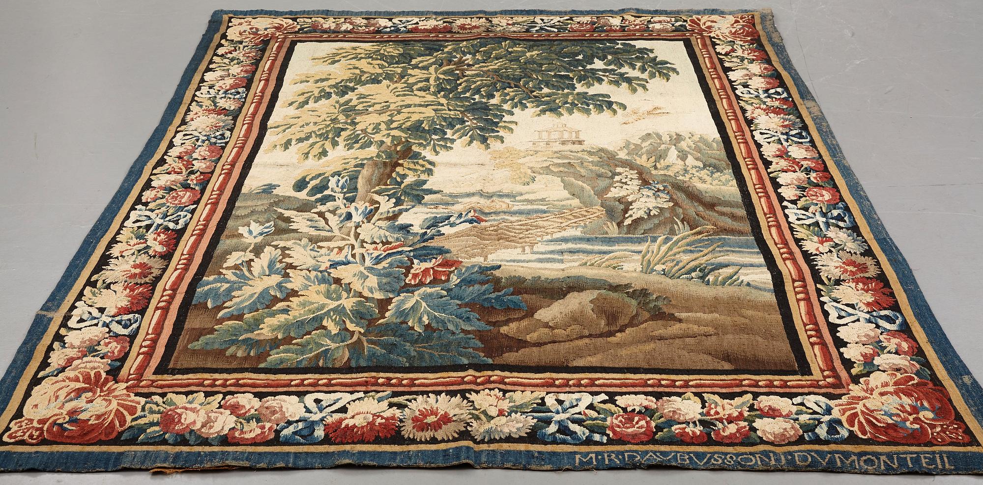 A "Verdure" tapestry, c 279 x 196 cm, signed M.R.D'AVBVSSONj.DVMONTEIL.