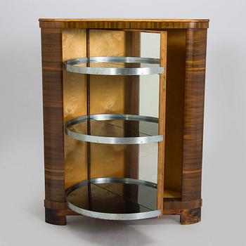 A 1930s bar cabinet.