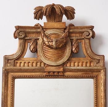 A Gustavian giltwood mirror by J. Åklerblad (active 1756-1799) and A. Öberg (1781-1791).