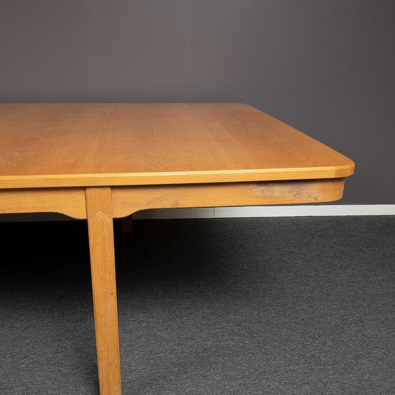 An oak conference table, probably by Carl Malmsten, mid 20th Century.