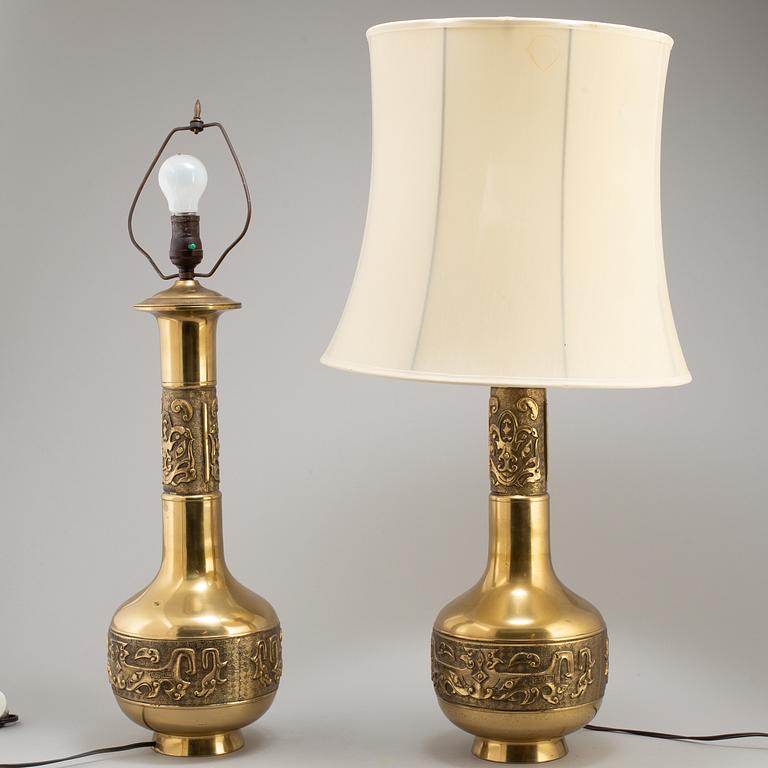 A pair of Chinese brass table lamps, 20th century.