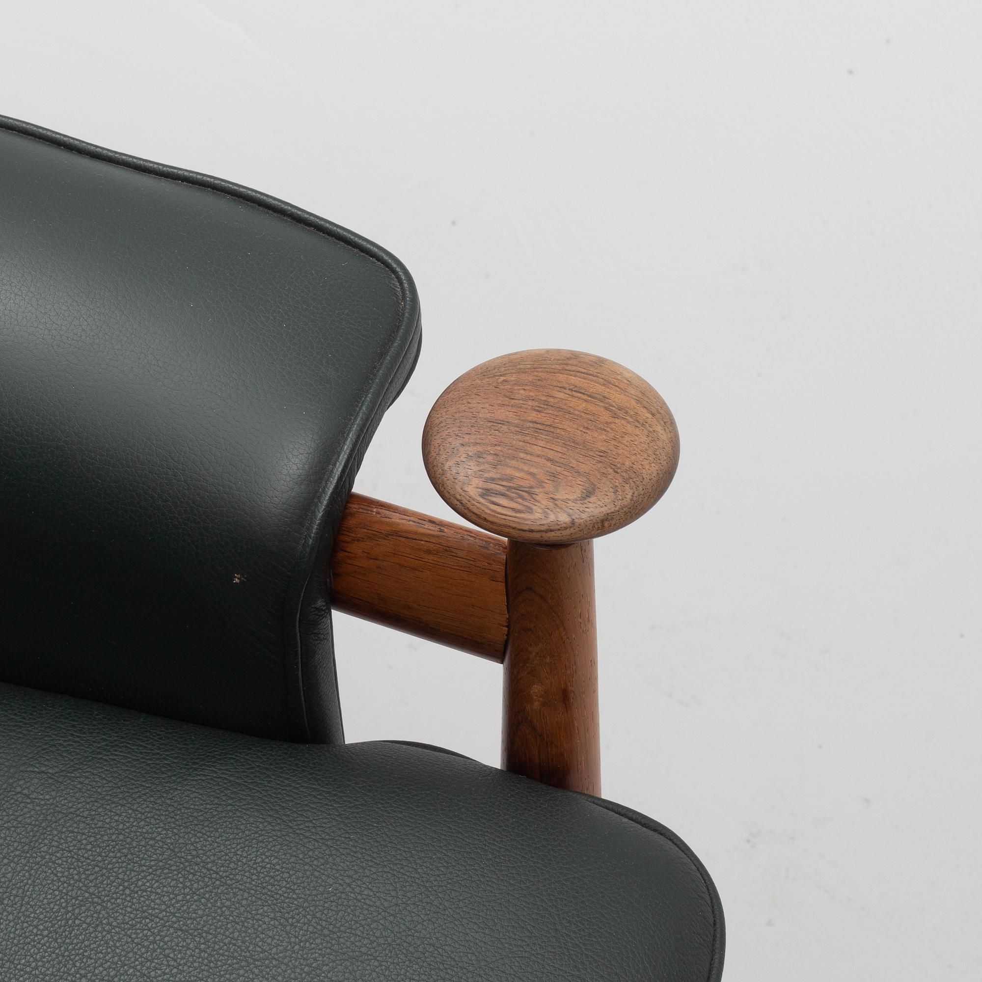 Finn Juhl, a 'Bwana' armchair and ottoman, France & Son, Denmark, 1960's.