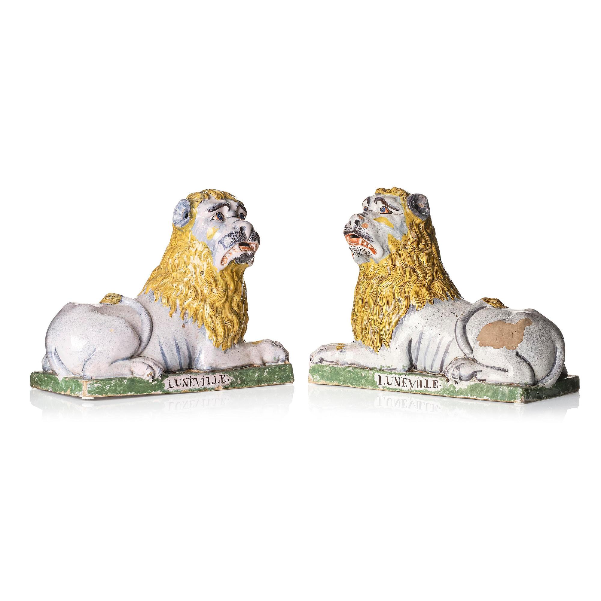 A pair of Luneville recumbent lions, circa 1780-1800.