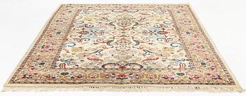 A carpet, signed, circa 286 x 212 cm.
