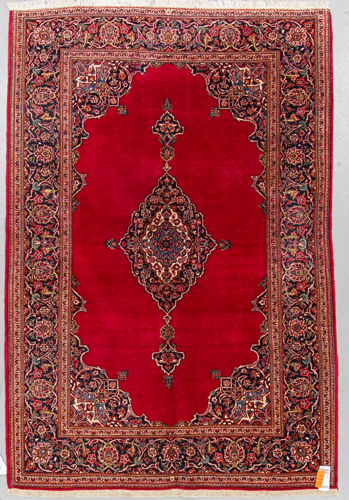 A RUG, semi-antique Kashan, ca 207 x 142 cm.