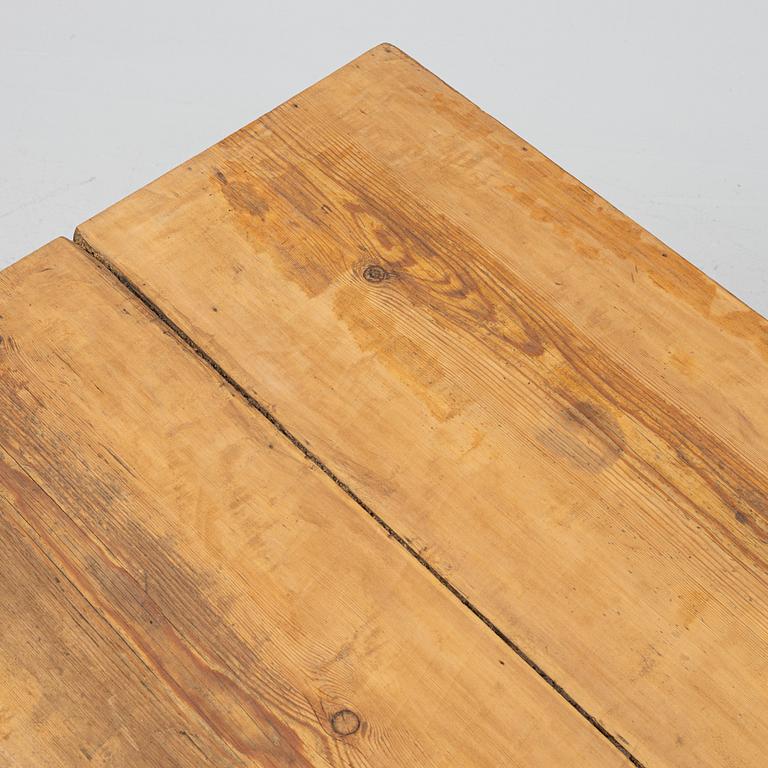 A pianted trestle table, 19th Century.