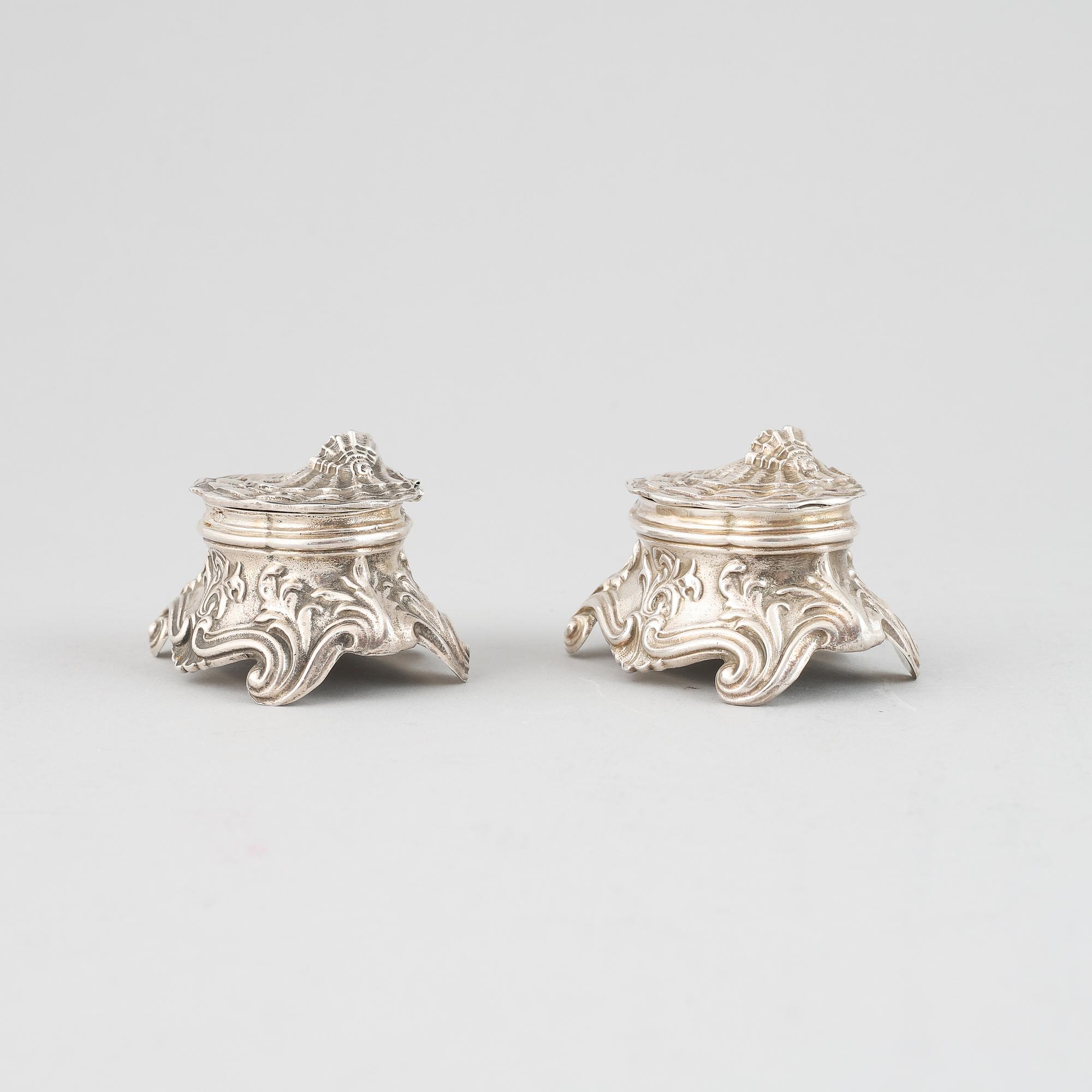 A pair of Louis XV-style silver salt cellars, Paris 19th century.
