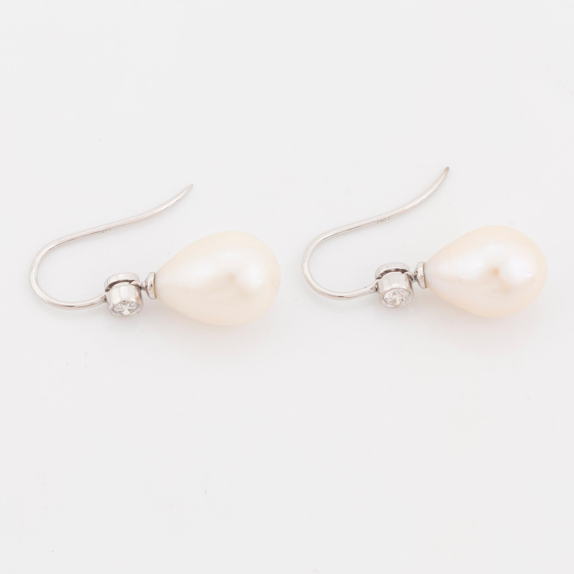 Cultured pearl and brilliant cut diamond earrings.