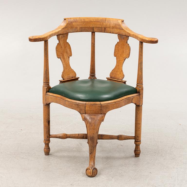 A rococo birch armchair, 18th Century.